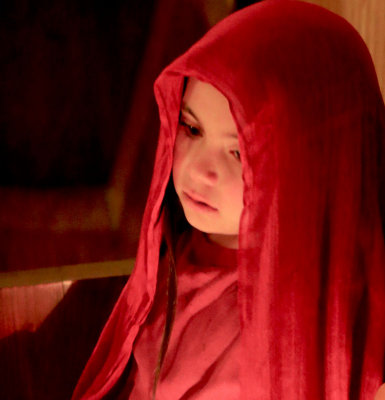 Tired girl in red veil