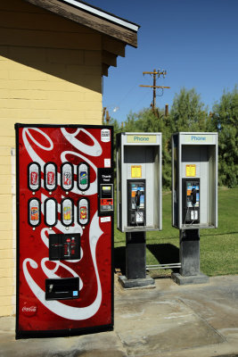 2 phone booths and coke machine