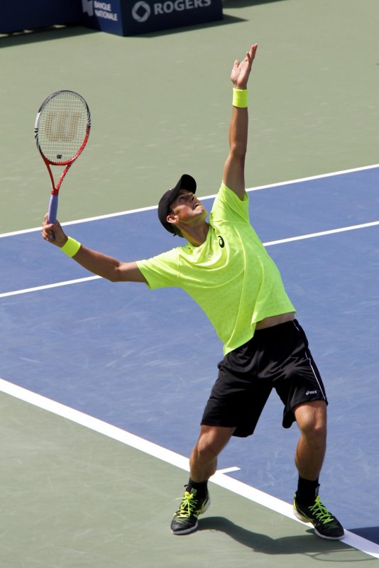 Pospisil (Canada) playing Isner.jpg