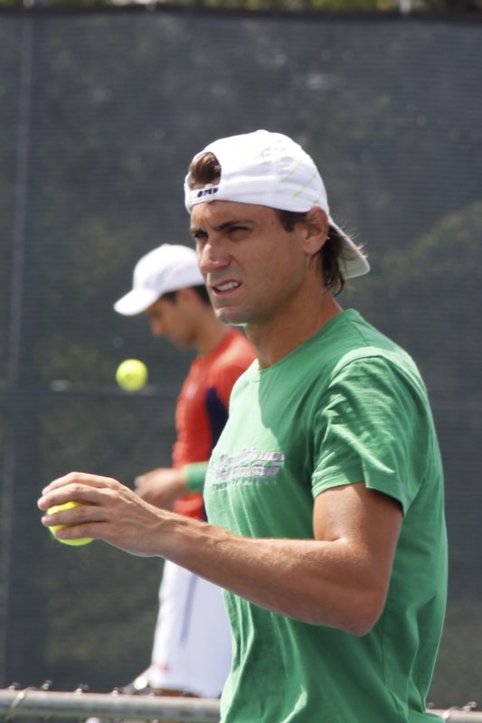 David Ferrer (Spain) with Djokovic in the back.jpg