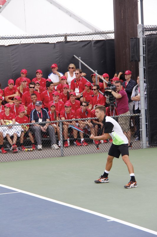 Peliwo (Canada) against Istomin on Court 9.jpg