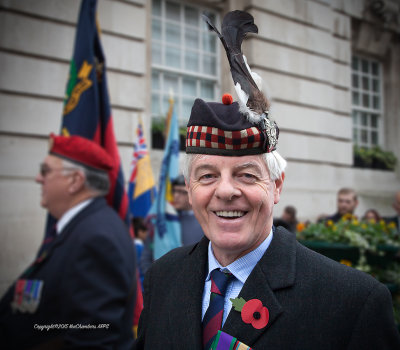 Veteran wearing the Glengarry Cap and Black Hackle of the King's Own Scottish Borderers 