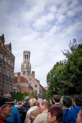 boat tour of Bruges: fellow at front, light brown tam