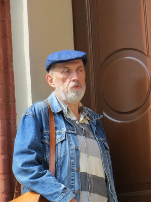 Man Watching the Tourists in Torun