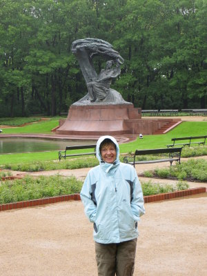 Chris in Front of Chopin Statue in Rainy Warsaw