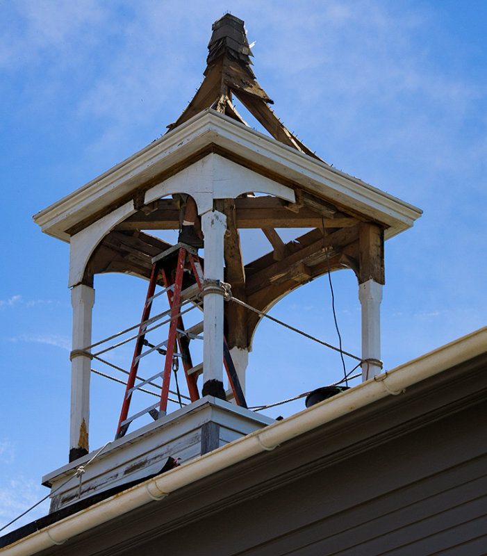 Foot on a stepladder