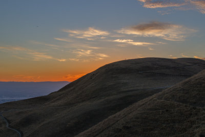 Lone hiker at sunset