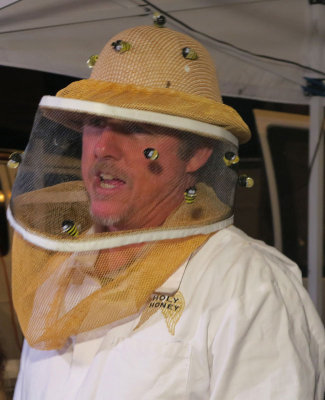 Hard selling honey at night market