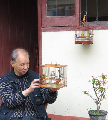 Talking to his birds in Tangilawan