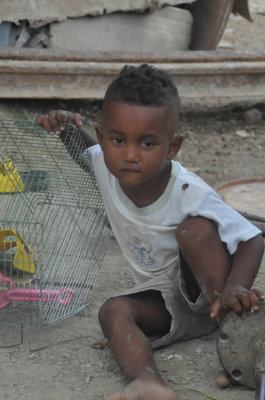  Kid at play in Haitian community