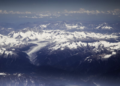Glacier from 30,000 ft. Shot from window of aircraft.