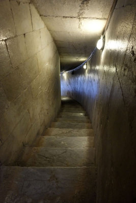 The marble stairs leading down from the gallery