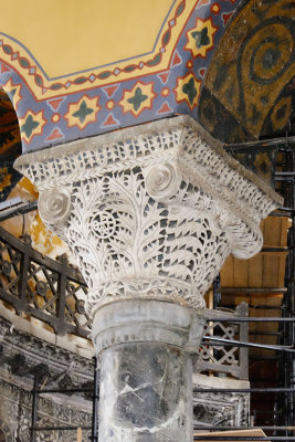 Lace metal work on top of columns