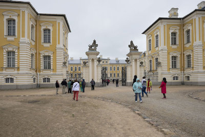 Two lions wearing crowns sit atop the central gate to Rundale Palace