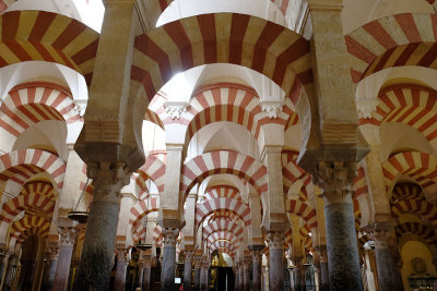 The famous alternating red and white voussoirs of the arches