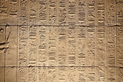 Temple hieroglyphs on stone at Philae
