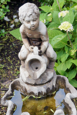 Fountain with boy and jug