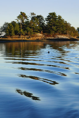 Clampit Island with waves.