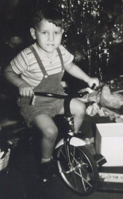 Jim Cerny with new tricycle at 405 South (1947).