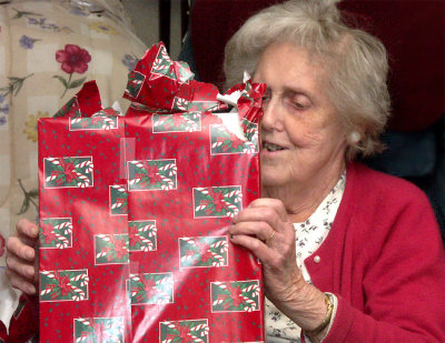 Mary Robb opening a present (2004).