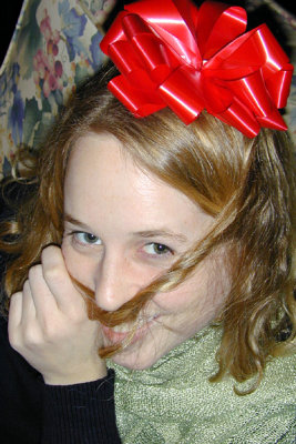 Emily Amarosa with holiday bow (2004).