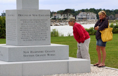 Visitors inspecting the monument.