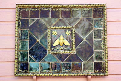 Decorative tile with bee.