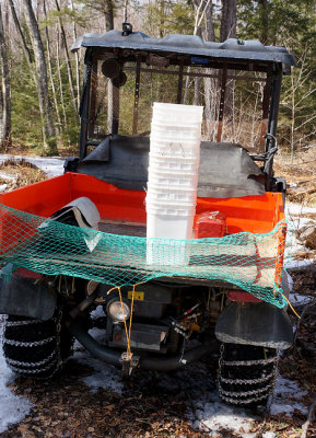 Kubota RTV 900, four-wheel drive, with chains.