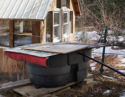 Gathering tank for gravity feed to sugar house.