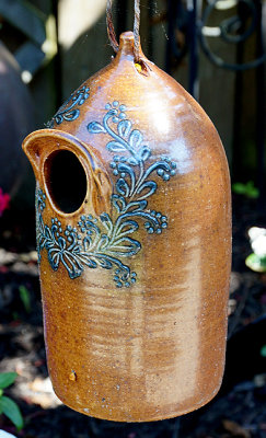 Pottery bird house.