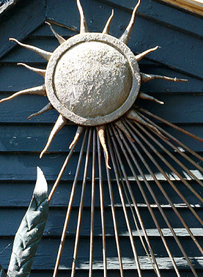 Deer and sun-rays sculpture - detail.