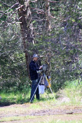 A painter along the river of Mirror Lake