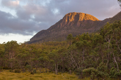 The last rays illuminate Castle Crag, from Kia Ora Hut