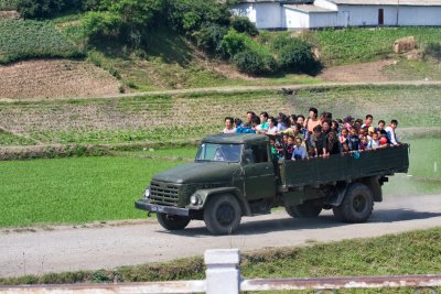 Overloaded truck on rural road