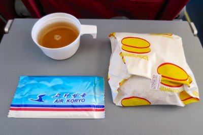 Hamburger and tea on board Air Koryo