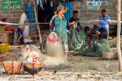 Fishermen Sorting the Nets