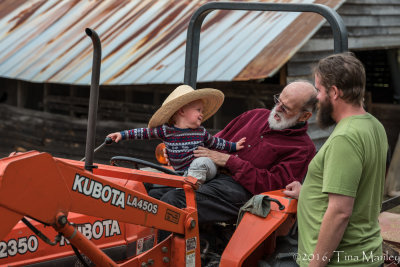 Red Drives the Tractor