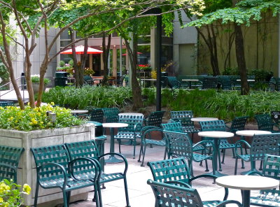 empty chairs at empty tables