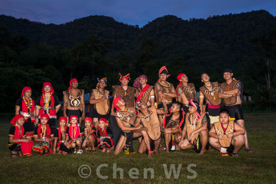 Bidayuh girls and men in traditional costume