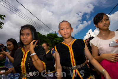 Villagers come out to join the procession