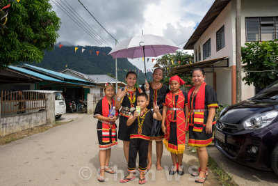 Villagers come out to greet the procession