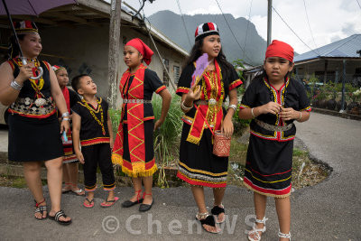 Villagers come out to greet the procession