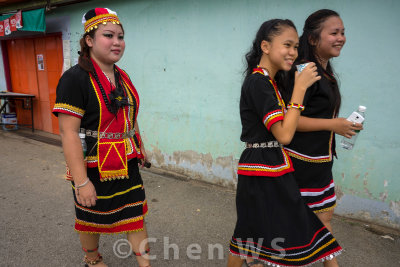 Villagers come out to join the procession