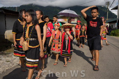 Villagers come out to join the procession