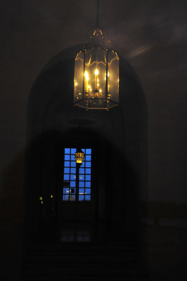 a look into a hallway from outside a back window