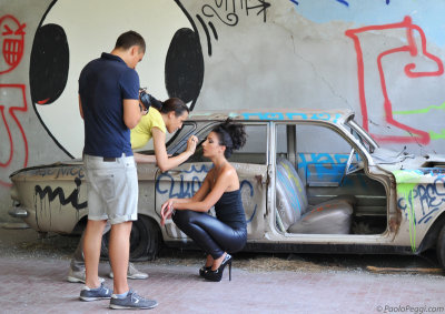 Finishing touches to Giulia's makeup, inside the set.