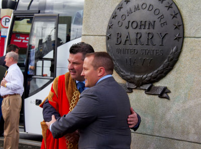 mayor greeting tourists at barry memorial.jpg