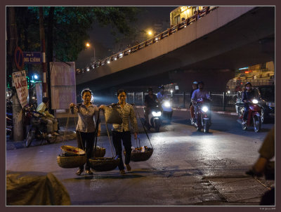 12 Carrying food. Hanoi