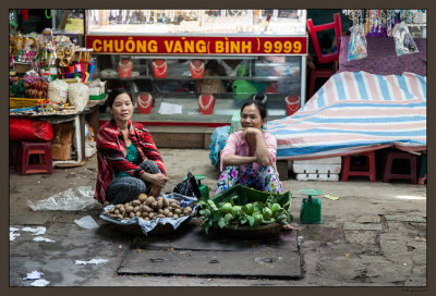 61 Two women in the market. Hue