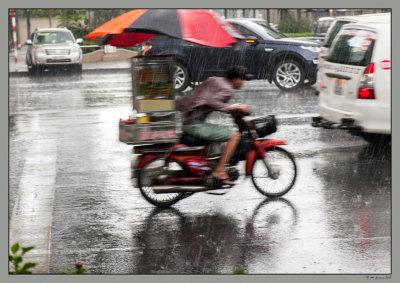 74 Under heavy rain in Saigon